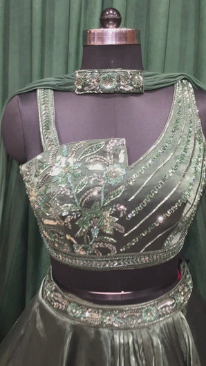 Bottle Green Organza Tissue Lehengas With Japanese Cut Dana and sequins Work