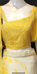 Chinon Silk Tie And Dye Skirt With Organza Ruffle Dupatta