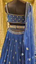 Load image into Gallery viewer, Blue Georgette Lehenga Choli With Mirror, Zari, and Sequins Work.
