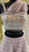 Load image into Gallery viewer, Mauve Net Lehenga Choli with Sequins And Thread Work
