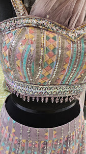 Mauve Net Lehenga Choli with Sequins And Thread Work
