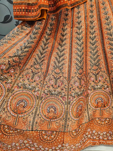 Orange Lehenga Choli with Hand Embroidery