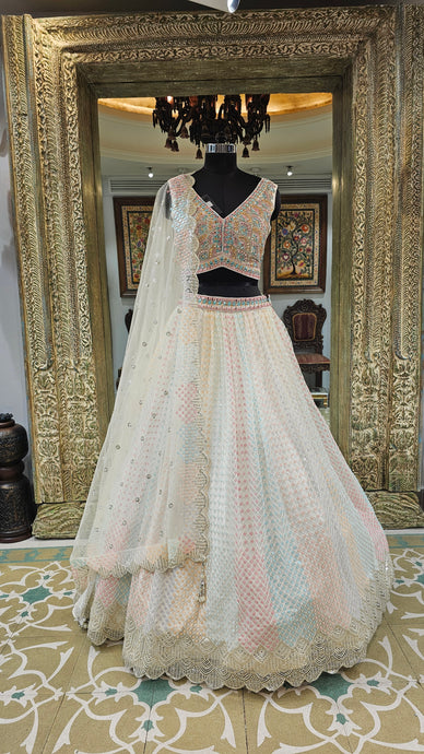 Silk Blouse With Net Lehenga with Mirror, Thread and sequins work