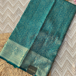 Green Banarasi Kanjivaram Unstitched Saree Embellished With Zari Work