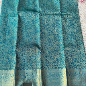 Green Banarasi Kanjivaram Unstitched Saree Embellished With Zari Work