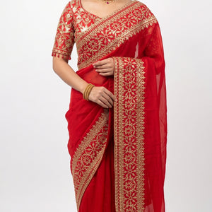 Beautiful Red Raw Silk Saree Trimmed With Leather Patch Work