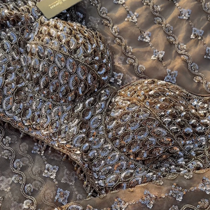 Golden Net Saree Embellished With Cutdana & Sequins Work