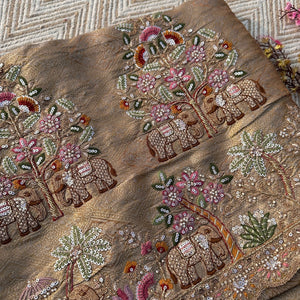 Dusty Beige Brocade Unstitched Saree Embellished With Moti, Sequins, Zarkan, Thread & Cutdana Work