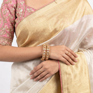 Ivory Silk Saree with Stitched Blouse and Zari, Cutdana & Sequins Work