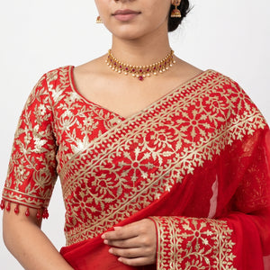Beautiful Red Raw Silk Saree Trimmed With Leather Patch Work
