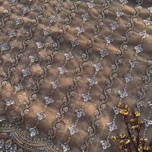 Golden Net Saree Embellished With Cutdana & Sequins Work