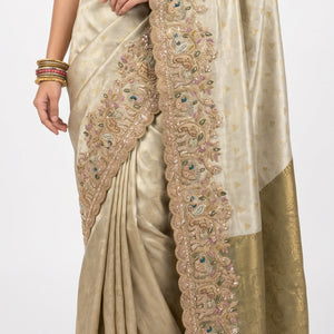 Muted Olive Gold Tissue Silk Saree Embellished with Zari, Cutdana & Zarkan Work