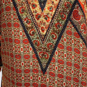 Orange Muslin Suit Set with Sequins Detailing