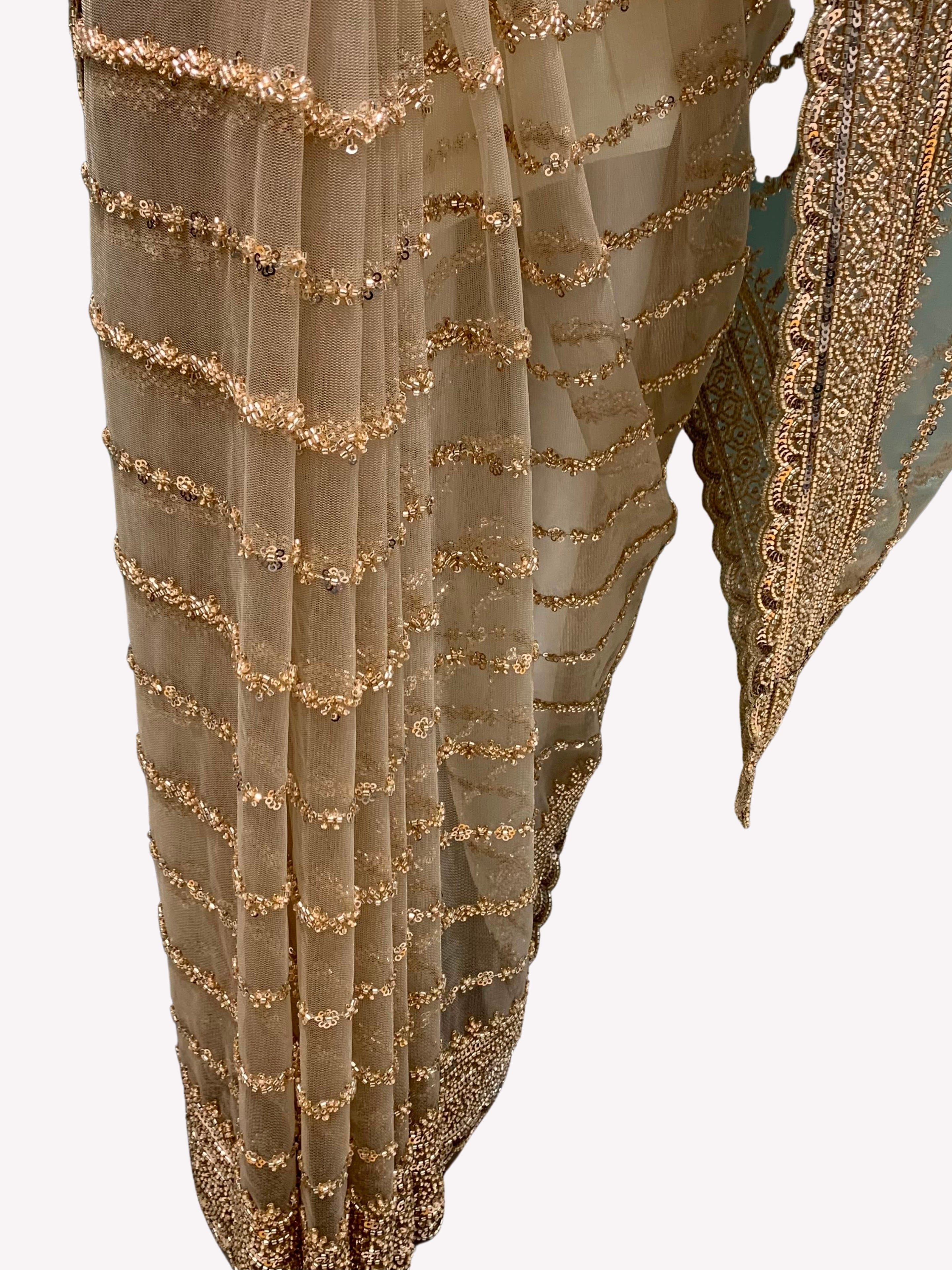 Golden Net Saree Crafted With Fine Cutdana & Sequins Highlights