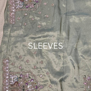 Muted Olive Gold Tissue Silk Saree Embellished with Zari, Cutdana & Zarkan Work