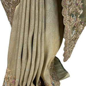 Muted Olive Gold Tissue Silk Saree Embellished with Zari, Cutdana & Zarkan Work