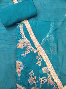 Blue Organza Semi-Stitch Suit With Thread Embroidery And Print Highlighted