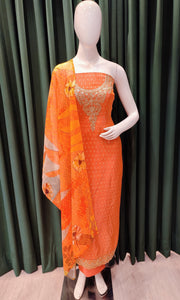 Orange Shimmer Unstitched Suit With Sequins and Zari Work