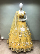 Load image into Gallery viewer, Yellow Net Lehenga With Gota And Mirror
