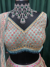 Load image into Gallery viewer, Sky Green Net Lehenga With Multi Zari And sequins
