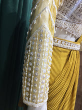 Load image into Gallery viewer, Mustard Drape Wrinkle lycra Saree With Sequins and Pearl Work

