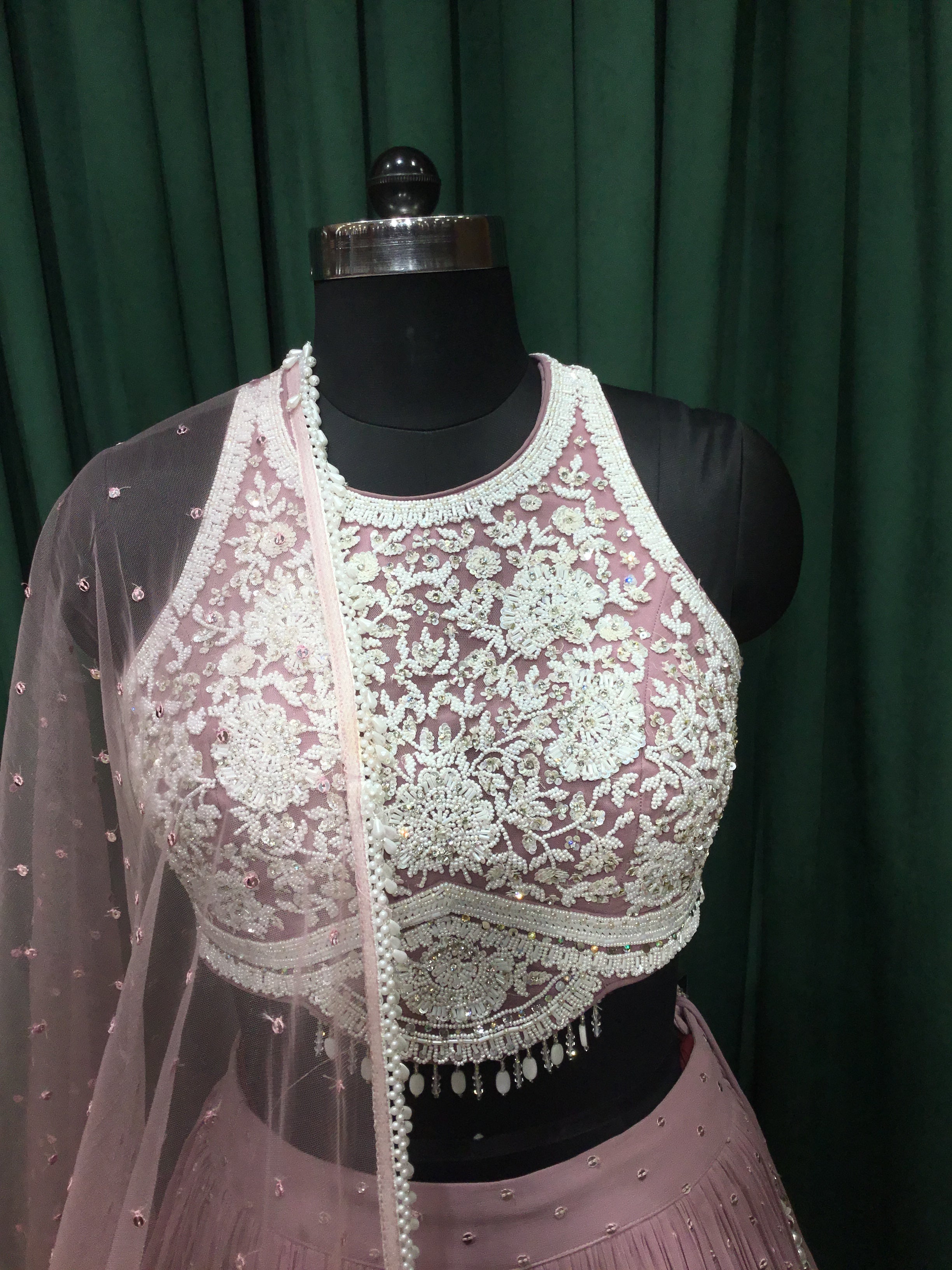 Mauves Pink Georgette Lehengas With Sequins and Pearl Work