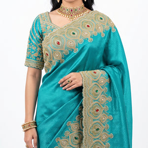 Turquoise Brocade Saree Embellished With Cut Dana, Stone, Sequins & Moti Work
