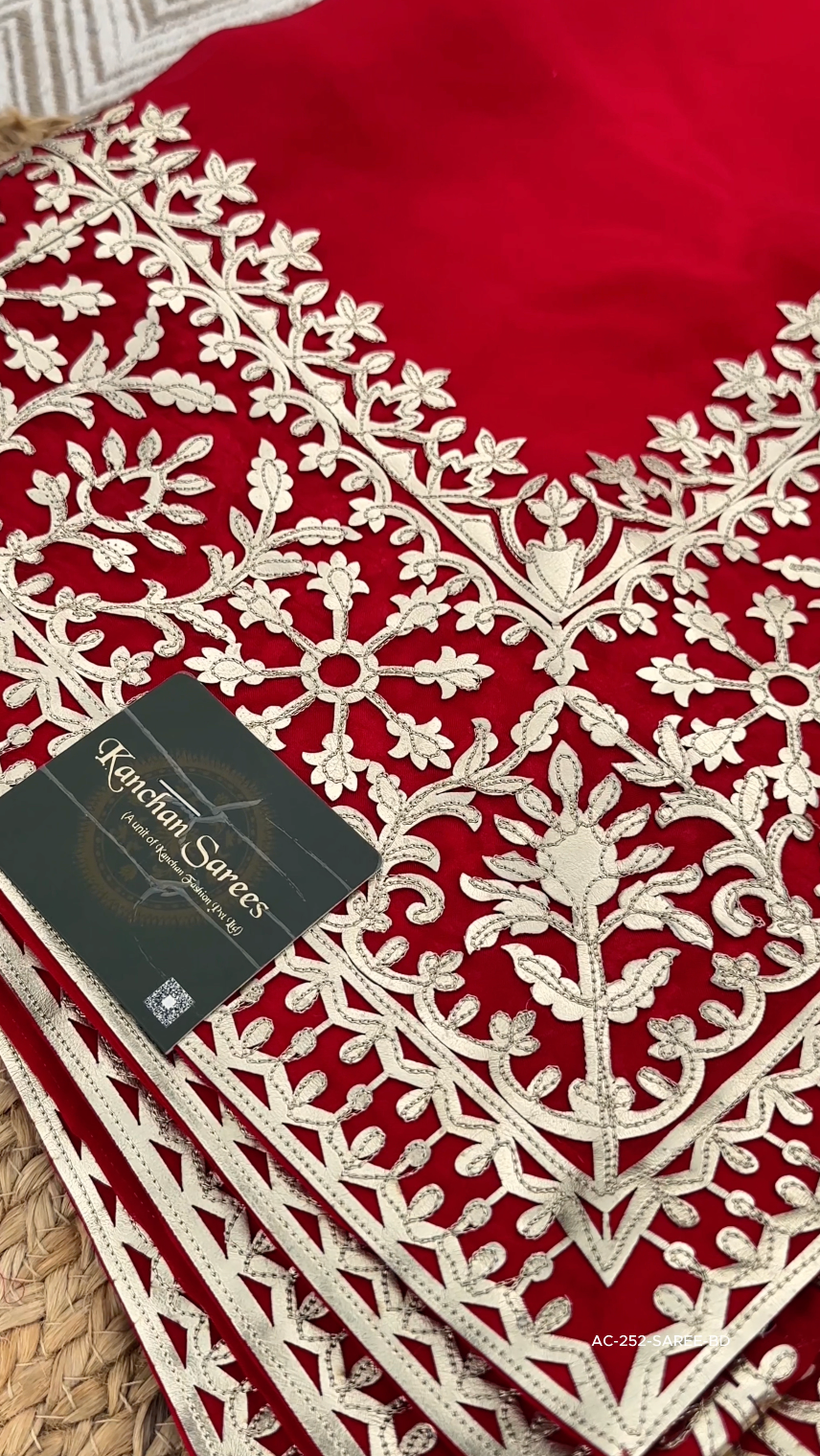 Beautiful Red Raw Silk Saree Trimmed With Leather Patch Work
