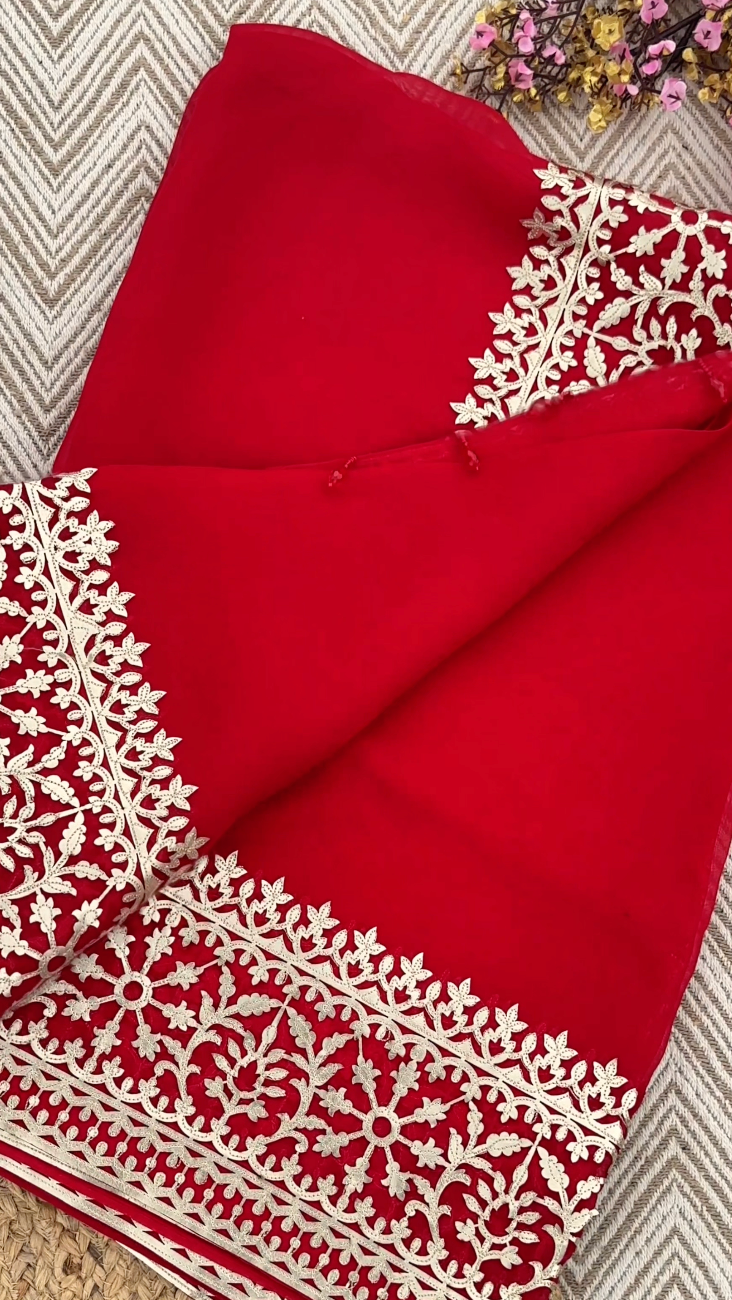 Beautiful Red Raw Silk Saree Trimmed With Leather Patch Work