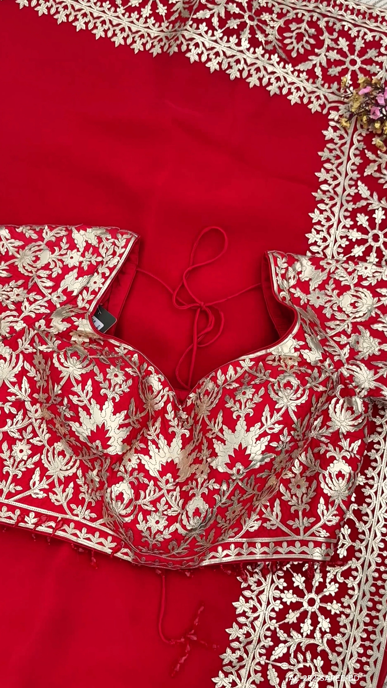 Beautiful Red Raw Silk Saree Trimmed With Leather Patch Work