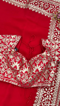 Beautiful Red Raw Silk Saree Trimmed With Leather Patch Work