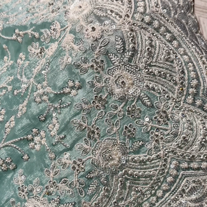 Sky Green Organza Unstitched Saree Embellished With Intricate Handwork