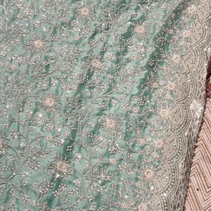 Sky Green Organza Unstitched Saree Embellished With Intricate Handwork