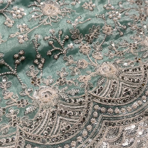 Sky Green Organza Unstitched Saree Embellished With Intricate Handwork