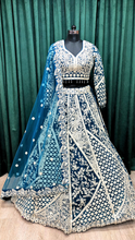 Load image into Gallery viewer, Blue Net Lehenga With White Thread And Sequence
