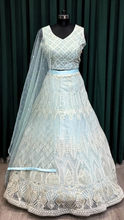 Load image into Gallery viewer, Sky Blue Net Lehenga With Lakhnavi and Sequins Work
