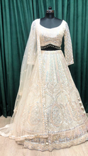 Load image into Gallery viewer, Cream Net Lehenga With Sequence
