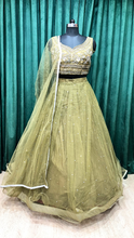 Load image into Gallery viewer, Green Net Lehenga With Sequins and Cut Dana Work
