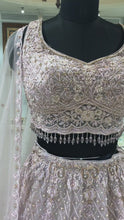 Load and play video in Gallery viewer, Lavender Net Lehenga With Thread And Sequence
