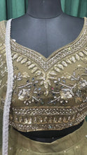 Load and play video in Gallery viewer, Green Net Lehenga With Sequins and Cut Dana Work
