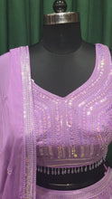 Load and play video in Gallery viewer, Lavender Georgette Lehenga with Resham and Sequins
