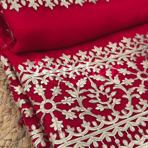 Beautiful Red Raw Silk Saree Trimmed With Leather Patch Work