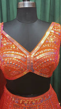 Load and play video in Gallery viewer, Orange Organza Lehenga Choli with Sequins Work
