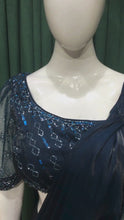 Load and play video in Gallery viewer, Teal Blue Tissue Organza Drape Saree With Sequins and Japanese Cut Dana Work

