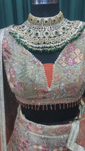 Load and play video in Gallery viewer, Dusty Green Net Lehenga With Multi Thread and Dori Work
