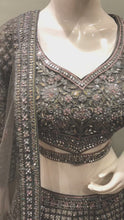 Load and play video in Gallery viewer, Gray Net Lehenga With Multi Dori And Mirror
