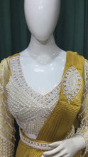 Load and play video in Gallery viewer, Mustard Drape Wrinkle lycra Saree With Sequins and Pearl Work
