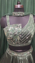 Load and play video in Gallery viewer, Rama Green Tissue Organza Lehenga With Sequins and Japanese Cut Dana
