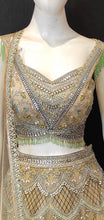 Load image into Gallery viewer, Gold Net Lehenga Choli with Hand Work and Dupatta
